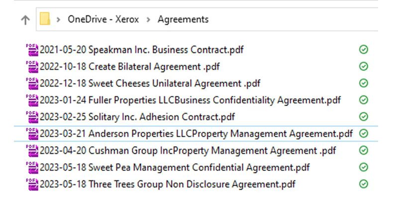 A close-up of a computer screen showing the Xerox Intelligent Filer interface with a document open and a field to rename the file, showcasing intelligent naming suggestions.